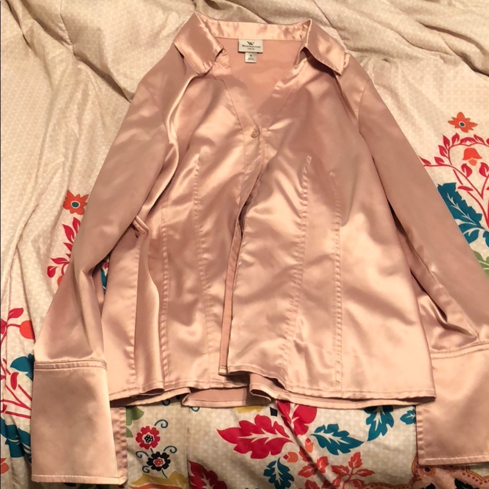 Woman’s pale pink blouse